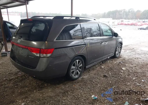2016 Honda Odyssey Touring/Touring Elite z USA, uszkodzony, nr VIN 5FNRL5H9XGB091627